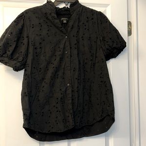 Black short sleeve eyelit top